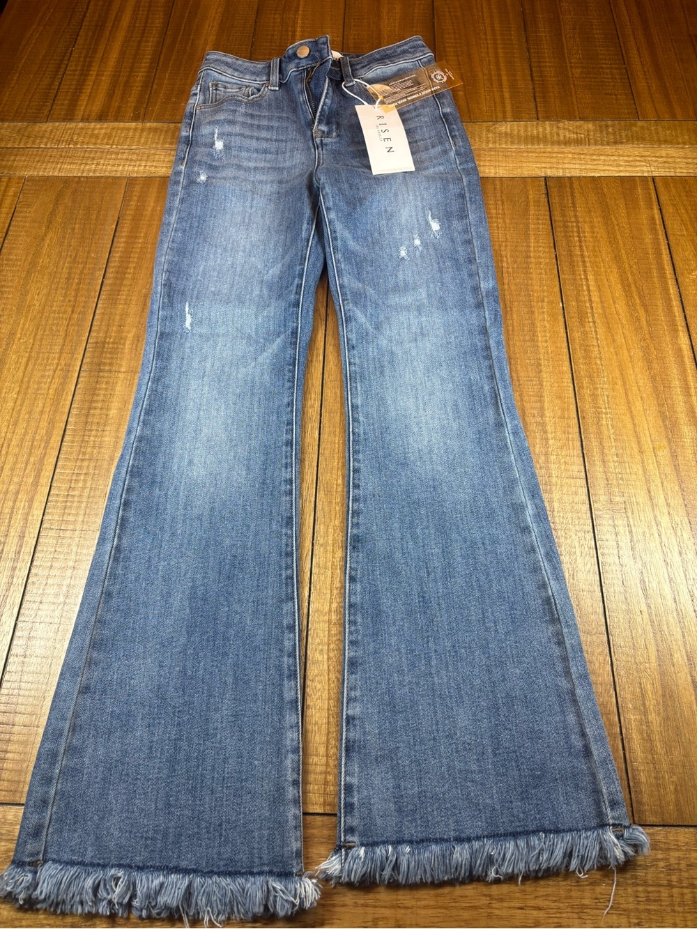 Risen Women's Blue Distressed Flare Jeans with Frayed Hem nwt